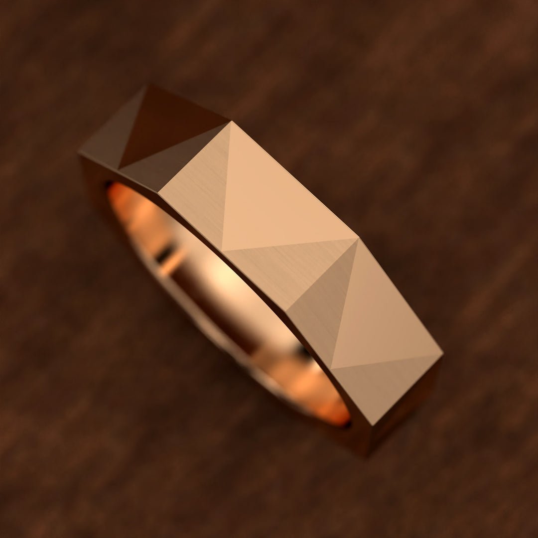 geometric faceted men’s band with brushed and polished planes