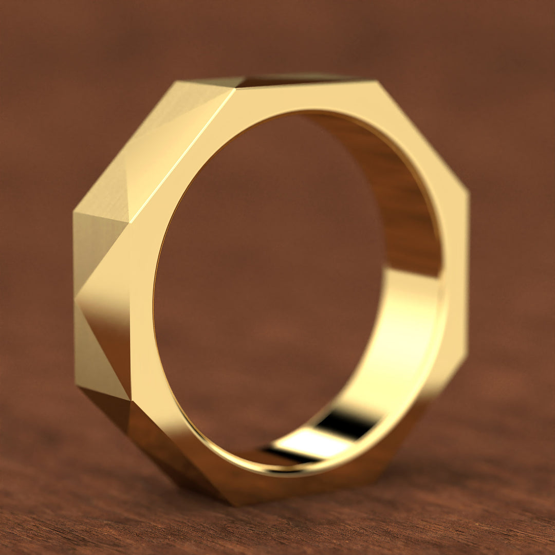 geometric faceted men’s band with brushed and polished planes