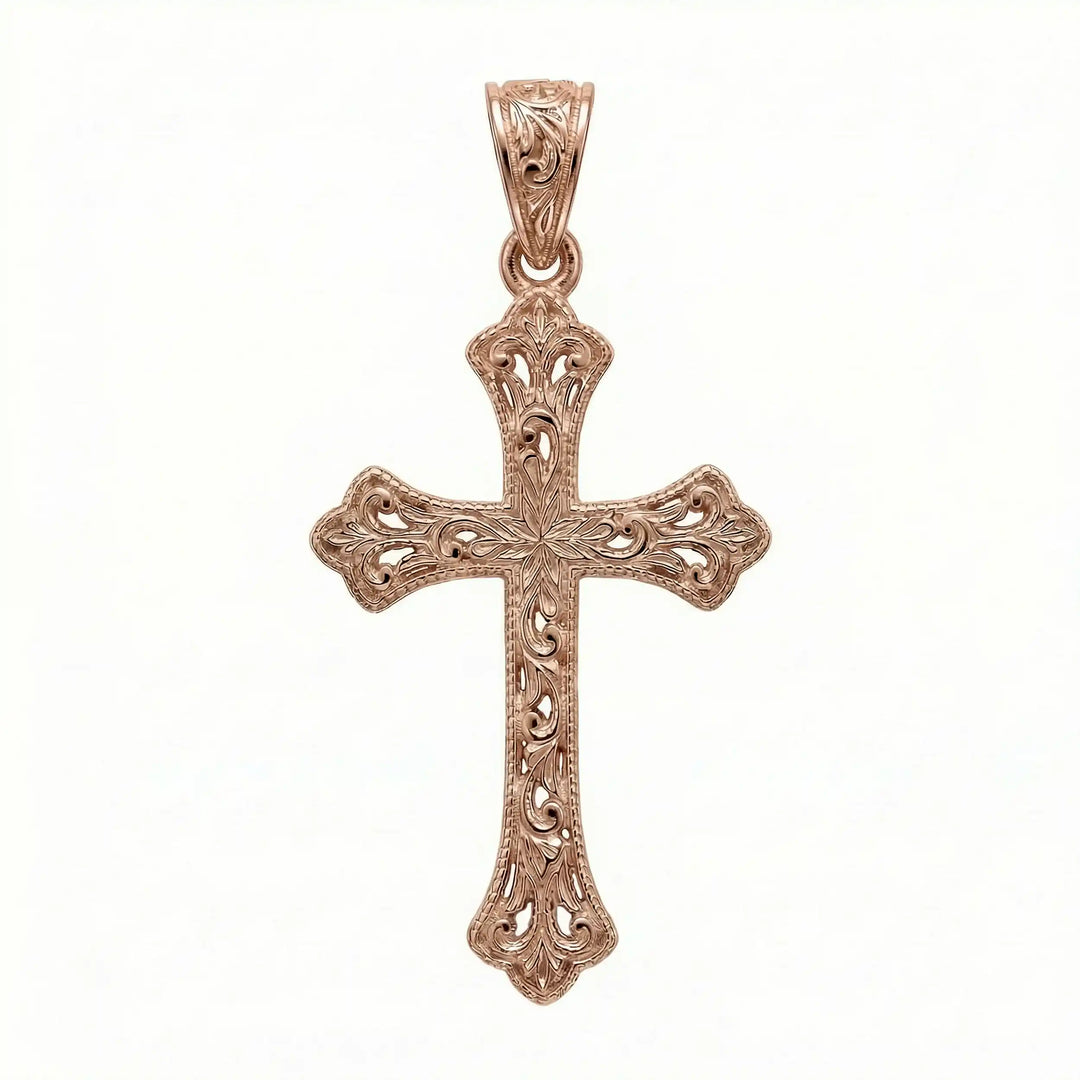 Ornate Gothic cross pendant necklace with engraved vintage-style detailing displayed on white background.
