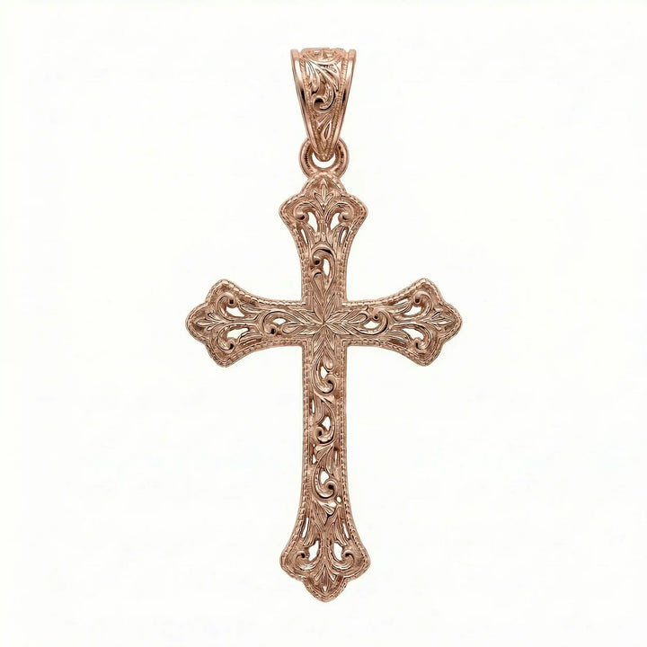 Ornate Gothic cross pendant necklace with engraved vintage-style detailing displayed on white background.