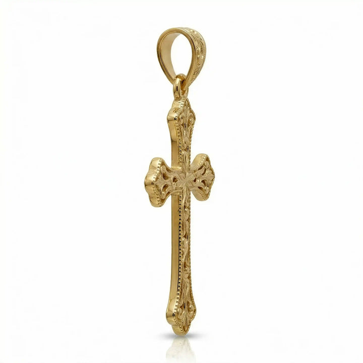 Ornate Gothic cross pendant necklace with engraved vintage-style detailing displayed on white background.
