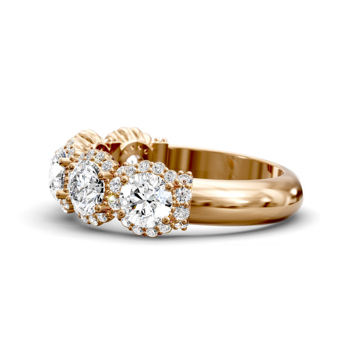 Gold halo band with large round center stones surrounded by sparkling diamond accents