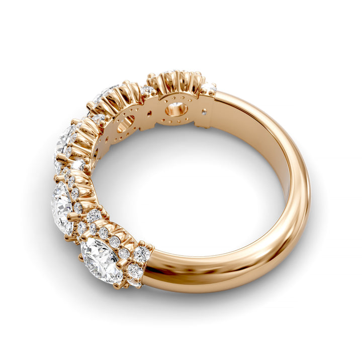 Gold halo band with large round center stones surrounded by sparkling diamond accents