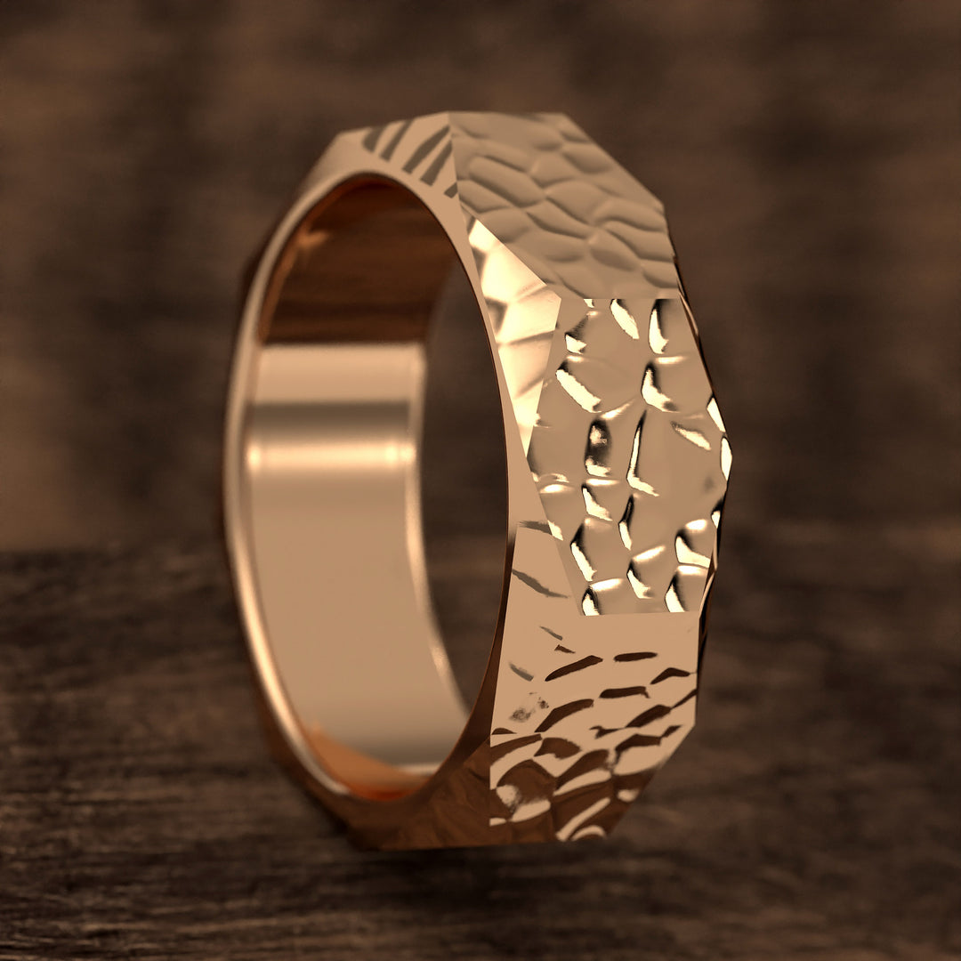 hammered hexagonal men’s wedding band with faceted texture