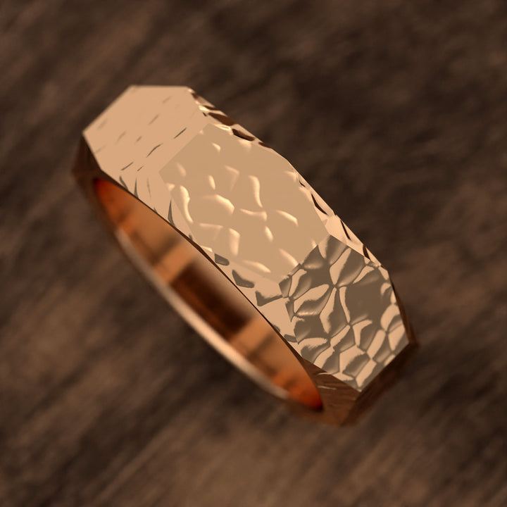 hammered hexagonal men’s wedding band with faceted texture