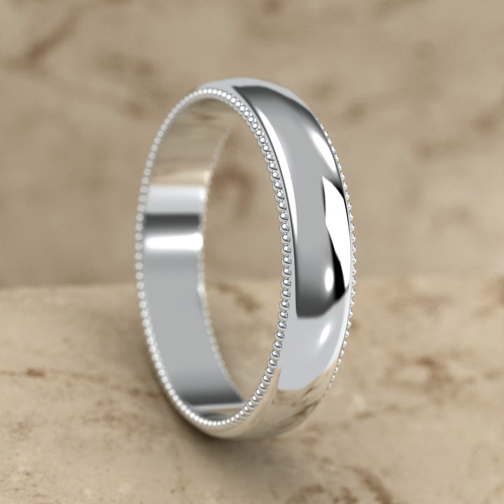 high-polish domed wedding band with fine milgrain borders