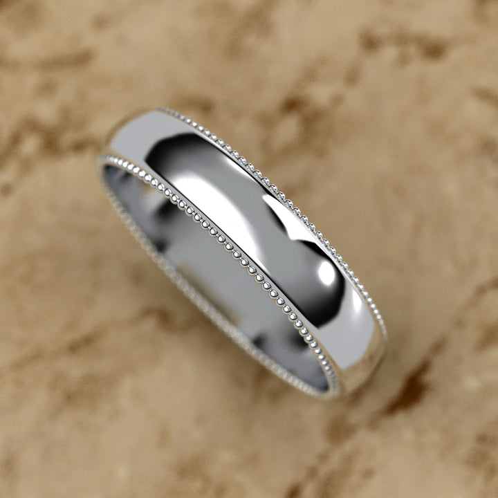 high-polish domed wedding band with fine milgrain borders