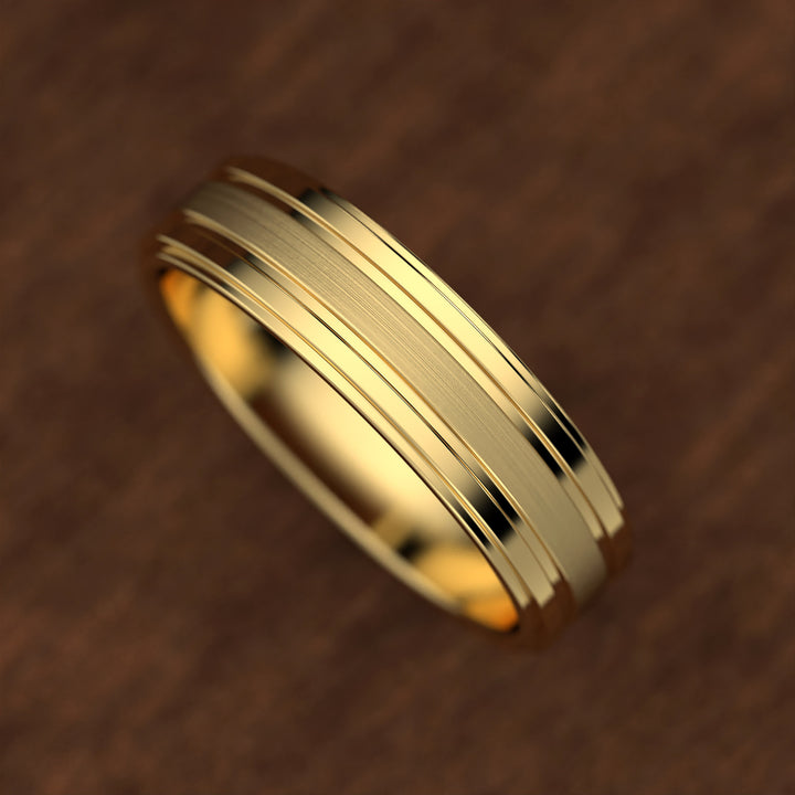 men’s band with ice-cut textured center and polished dual grooves