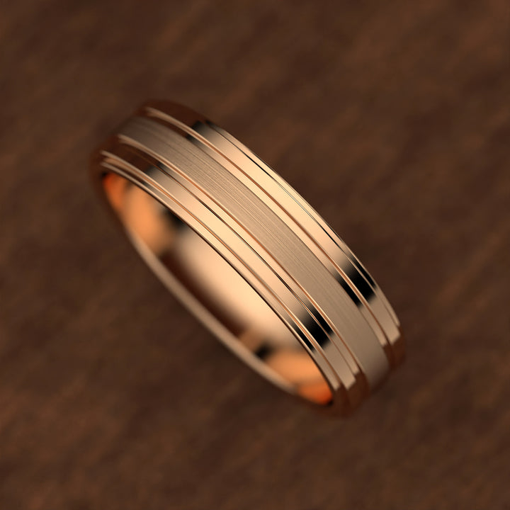 men’s band with ice-cut textured center and polished dual grooves