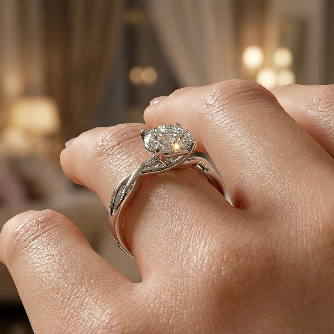 Round diamond engagement ring with infinity twist band front view.