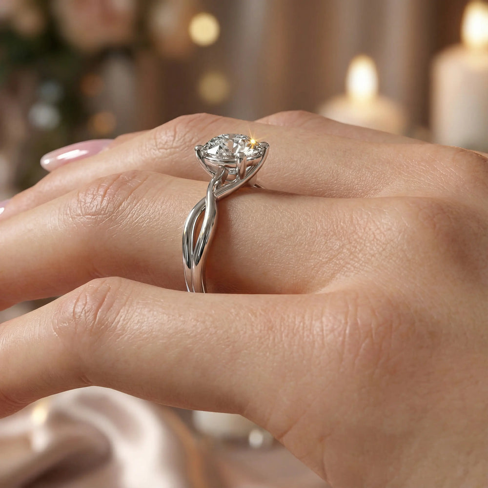 Round diamond engagement ring with infinity twist band front view.