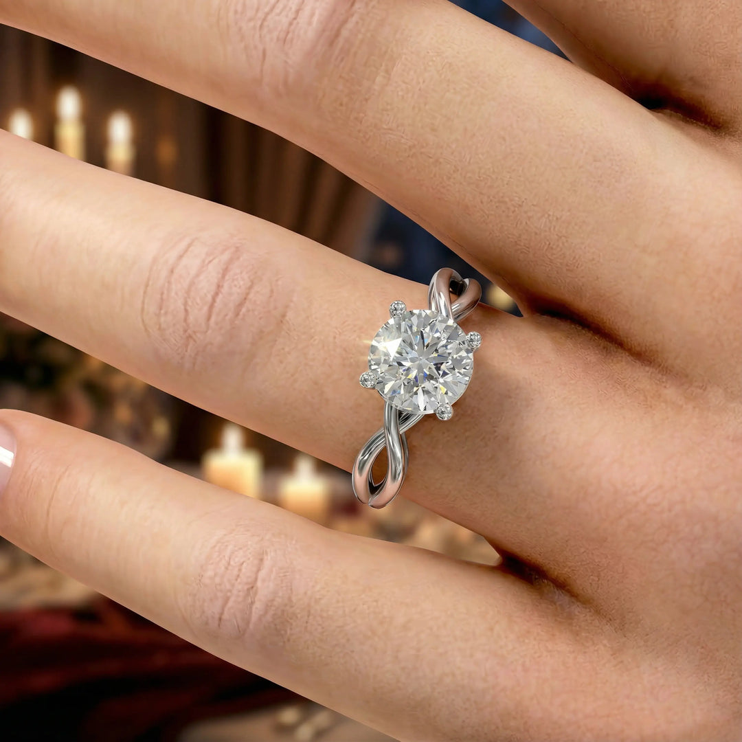 Round diamond engagement ring with infinity twist band front view.