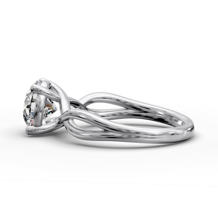 Round diamond engagement ring with infinity twist band front view.