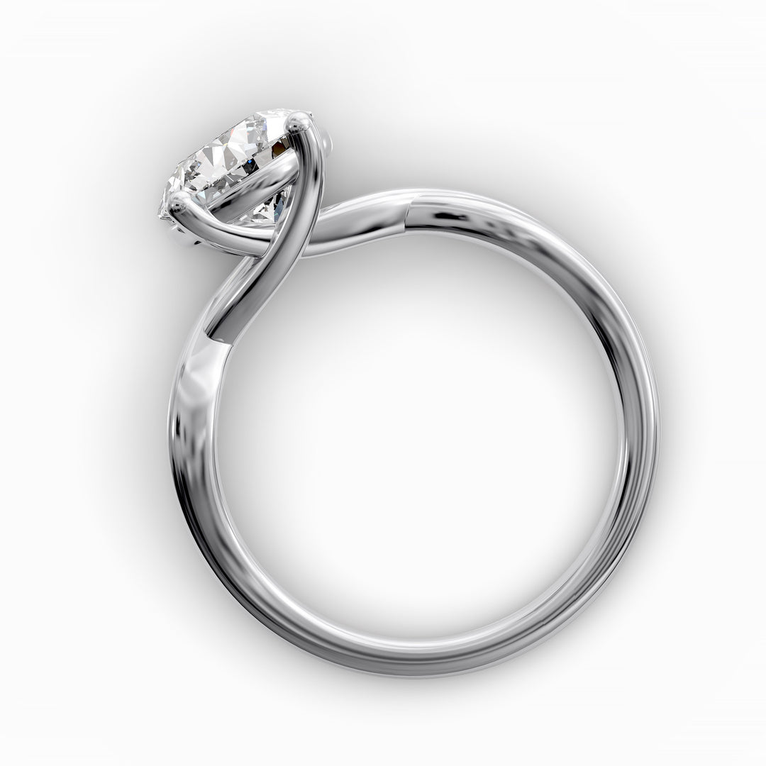 Round diamond engagement ring with infinity twist band front view.