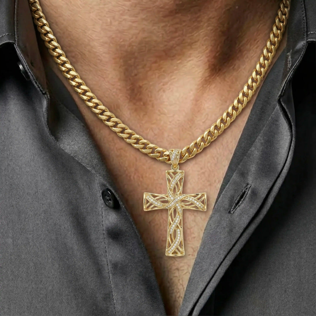 Lab-grown diamond Latin cross pendant with openwork design displayed on chest.