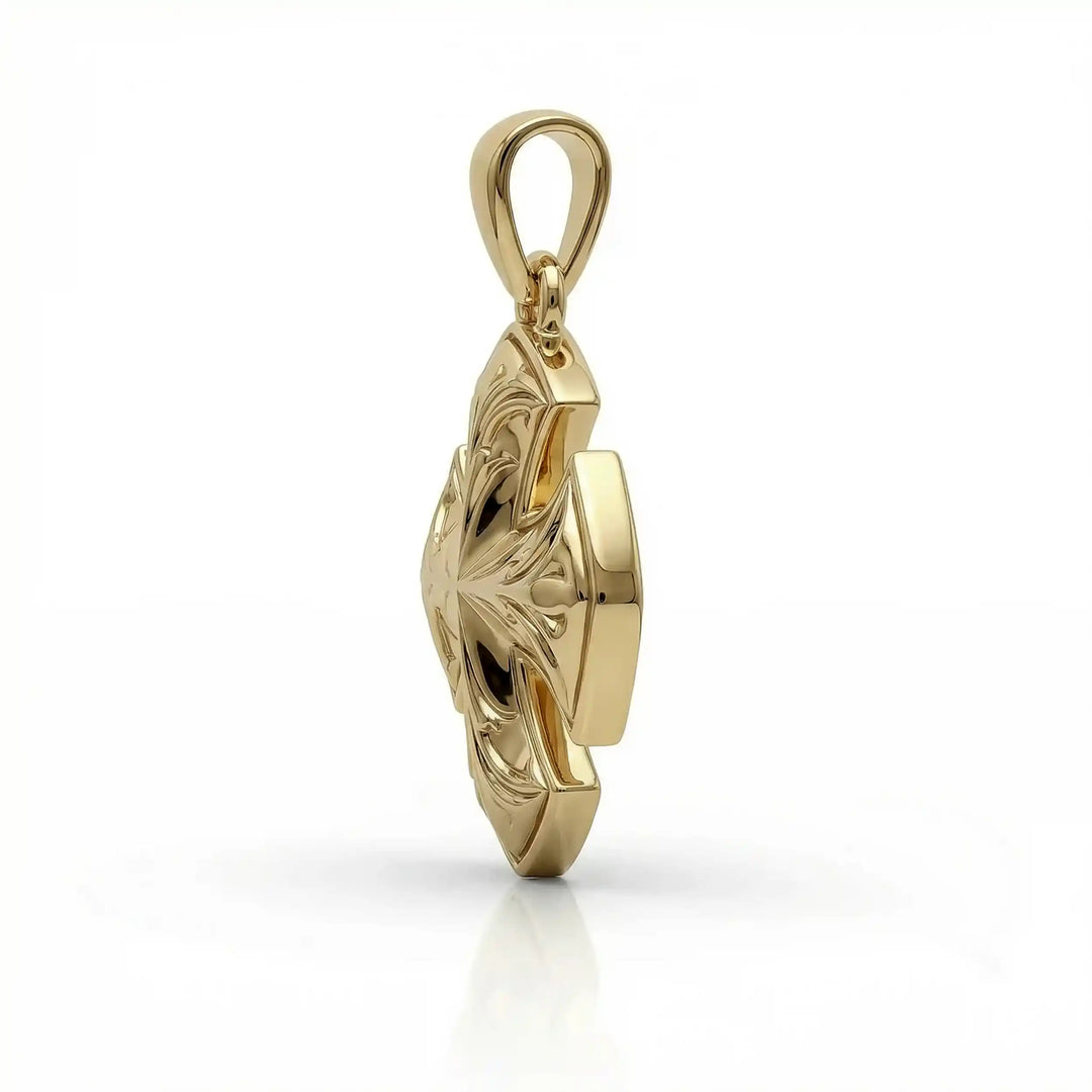 Maltese cross pendant with engraved ornamental design displayed on white background.
