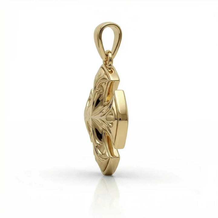 Maltese cross pendant with engraved ornamental design displayed on white background.