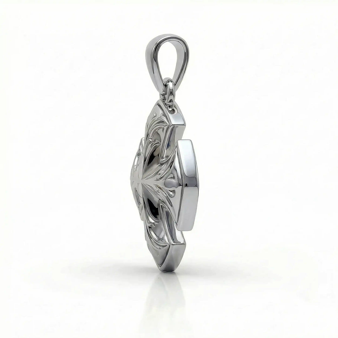 Maltese cross pendant with engraved ornamental design displayed on white background.
