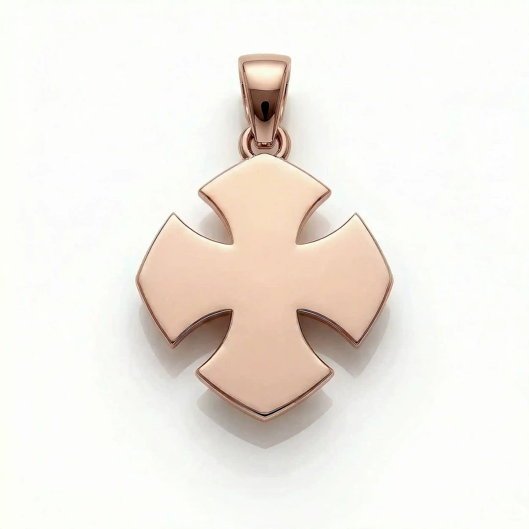 Maltese cross pendant with engraved ornamental design displayed on white background.