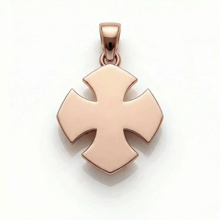 Maltese cross pendant with engraved ornamental design displayed on white background.