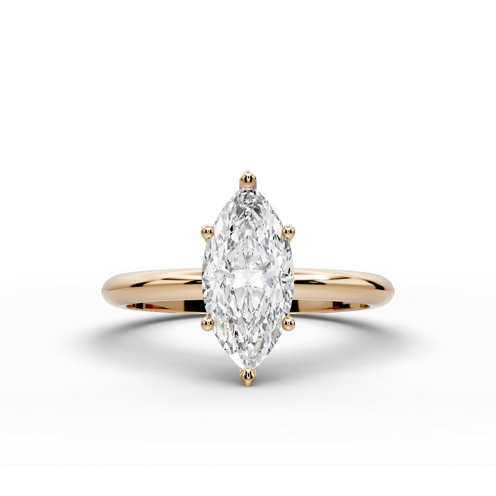 Marquise diamond six-prong solitaire engagement ring shown on a classic polished band.