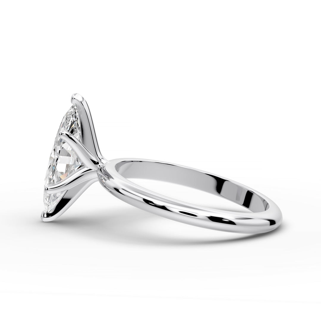 Marquise diamond six-prong solitaire engagement ring shown on a classic polished band.
