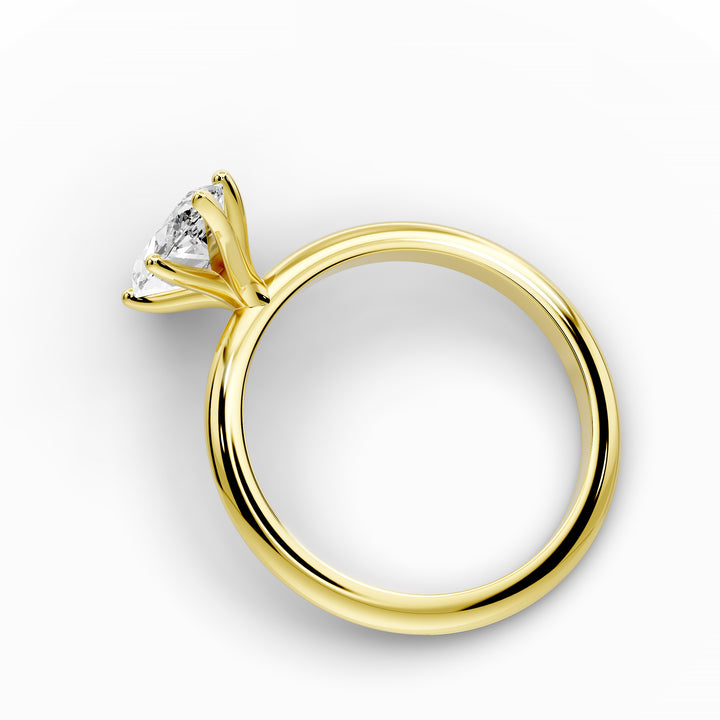 Marquise diamond six-prong solitaire engagement ring shown on a classic polished band.