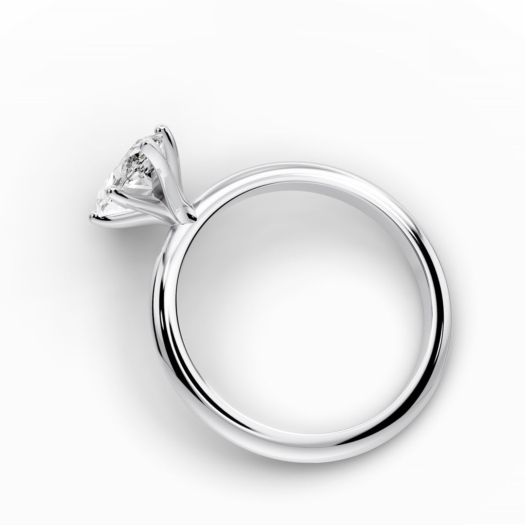 Marquise diamond six-prong solitaire engagement ring shown on a classic polished band.