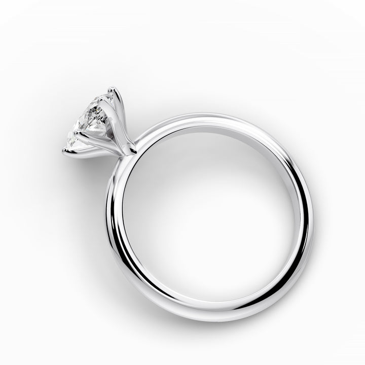 Marquise diamond six-prong solitaire engagement ring shown on a classic polished band.