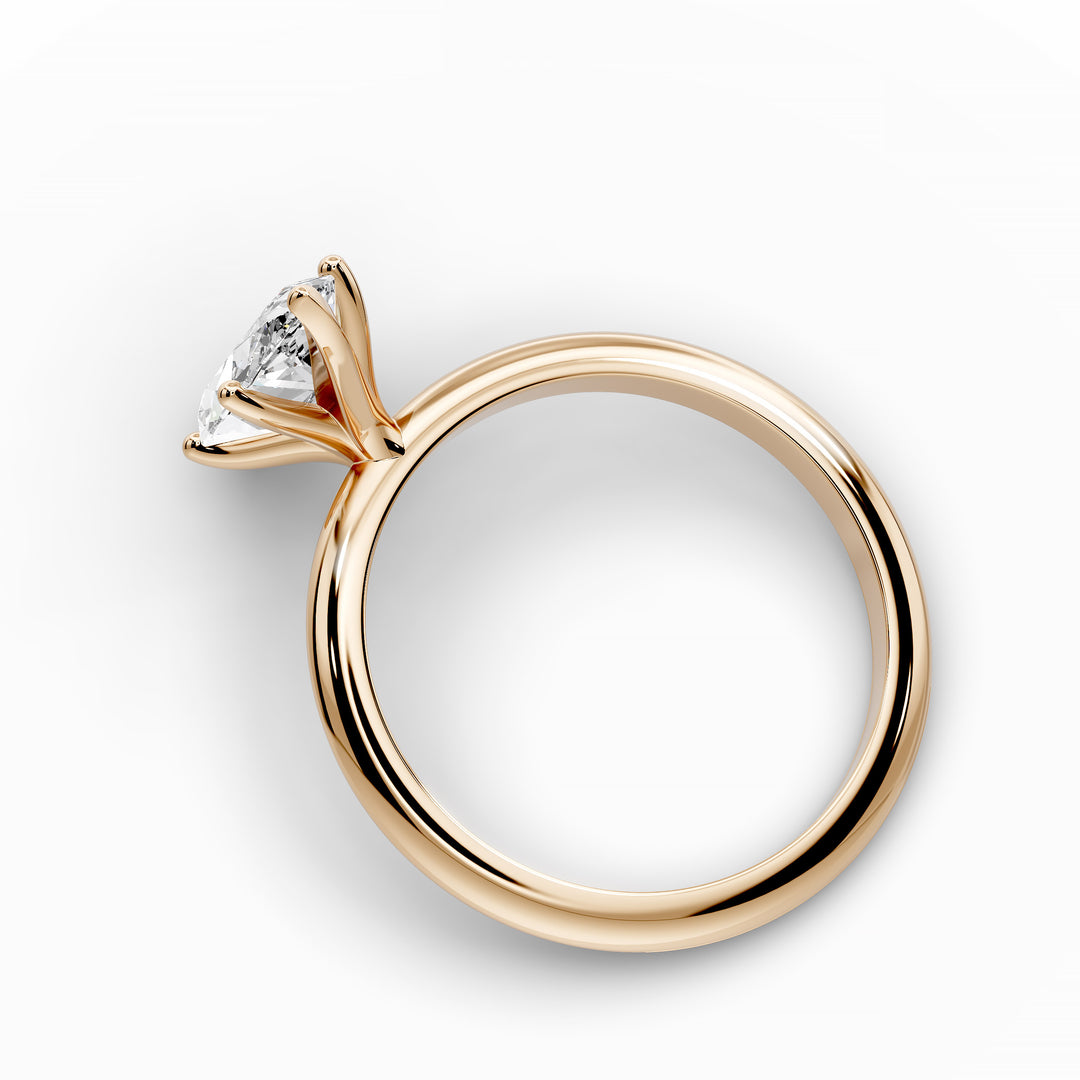 Marquise diamond six-prong solitaire engagement ring shown on a classic polished band.