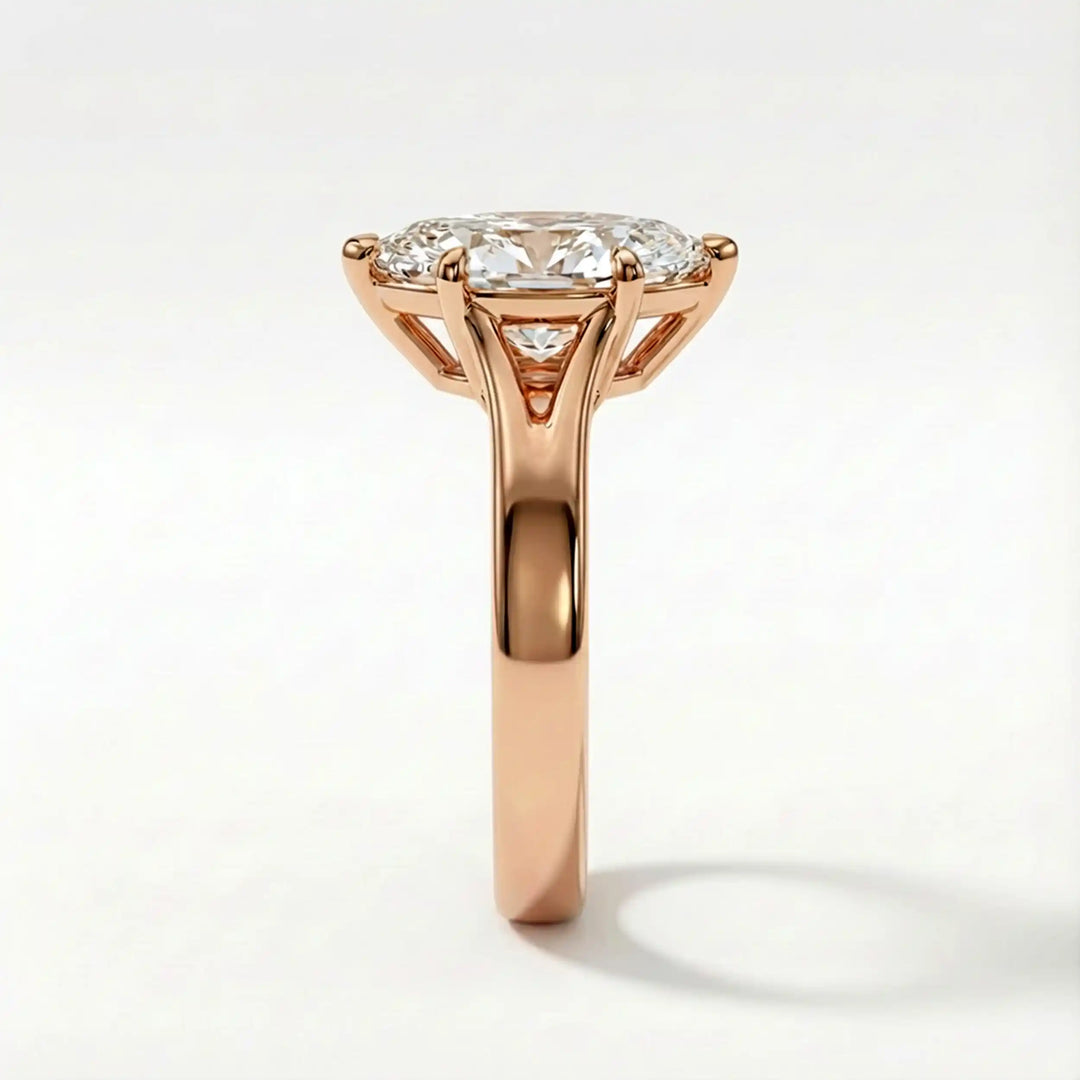 Marquise-cut lab-grown diamond split shank solitaire ring displayed on satin.
