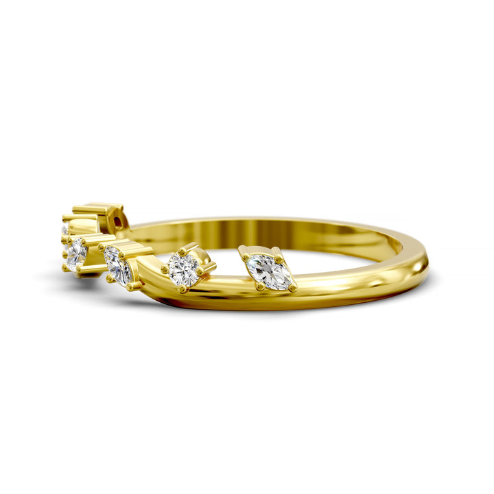 Curved open band with marquise and round diamonds set in a modern gold design