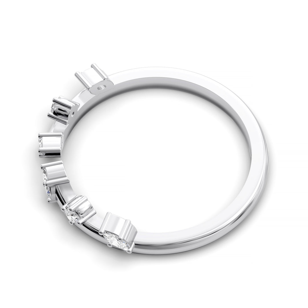 Curved open band with marquise and round diamonds set in a modern gold design