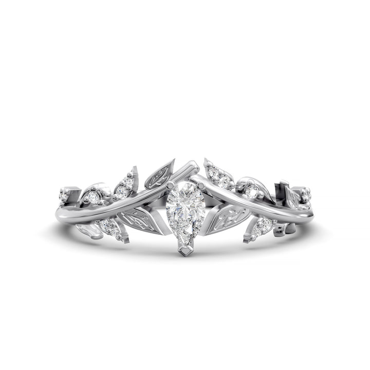 Leaf and vine wedding band with pear-shaped center stone and small accent stones