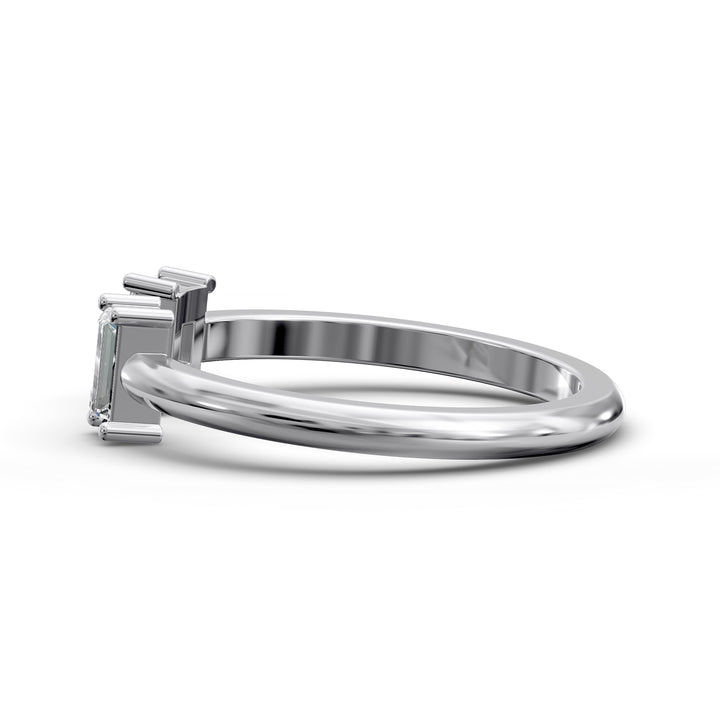 open cuff wedding band with baguette diamond accents in minimalist design