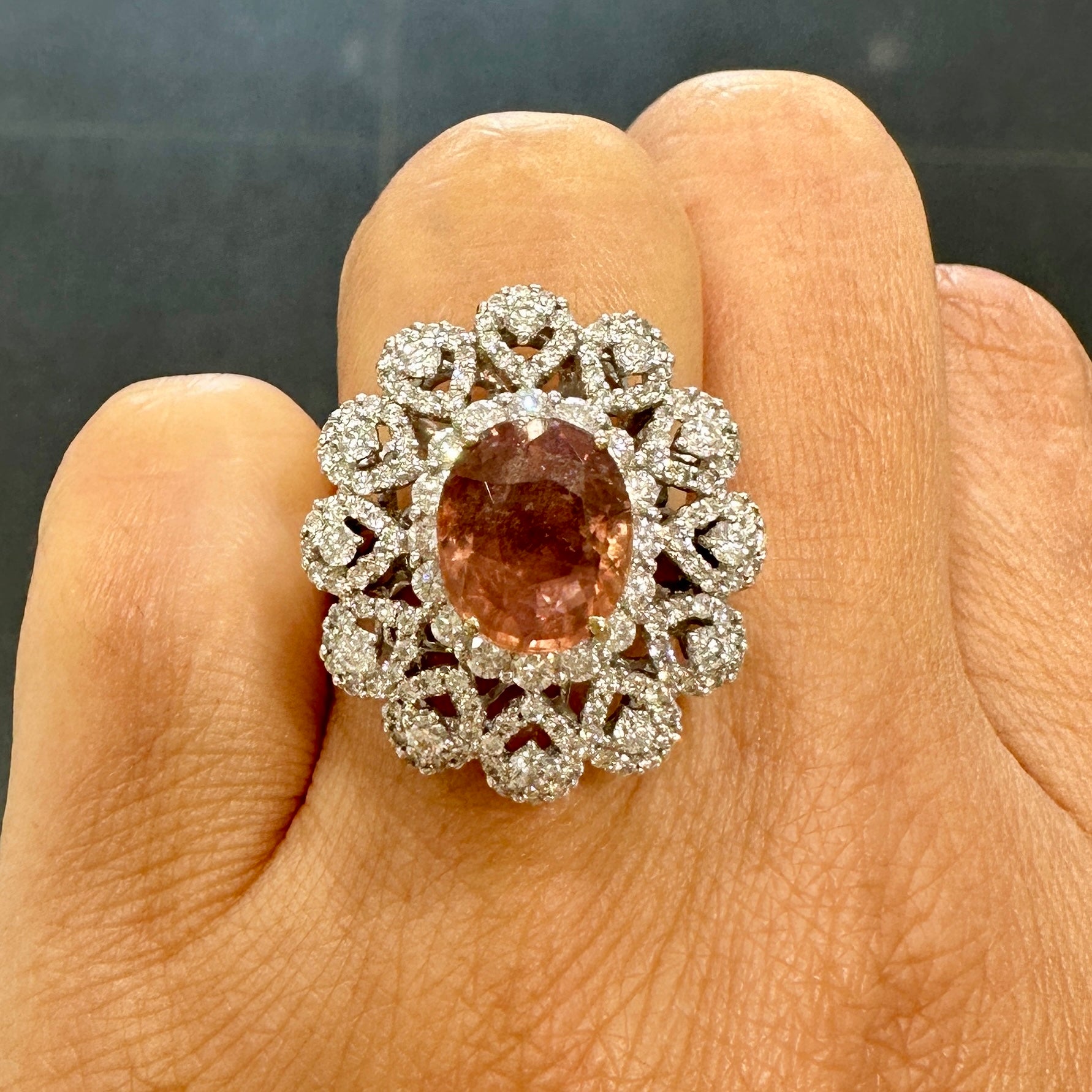 Natural Padparadscha sapphire ring with diamonds in 18K white gold