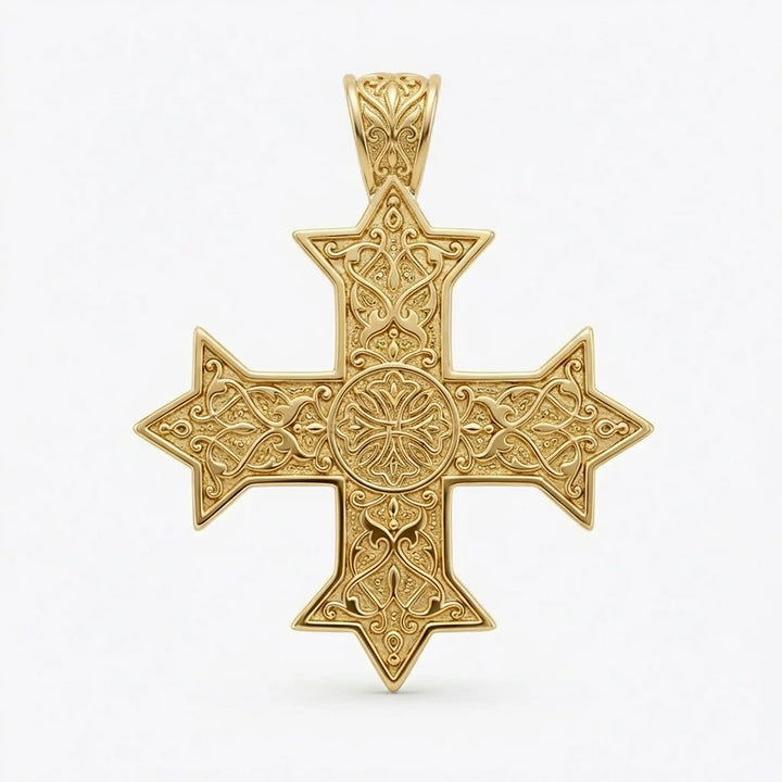 Ornate Coptic cross pendant with intricate filigree pattern displayed on neutral background.
