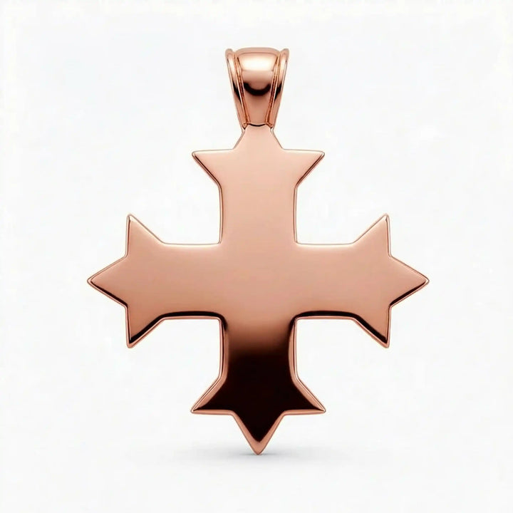 Ornate Coptic cross pendant with intricate filigree pattern displayed on neutral background.
