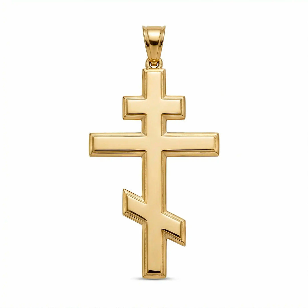 Orthodox three-bar Christian cross pendant displayed on white background.