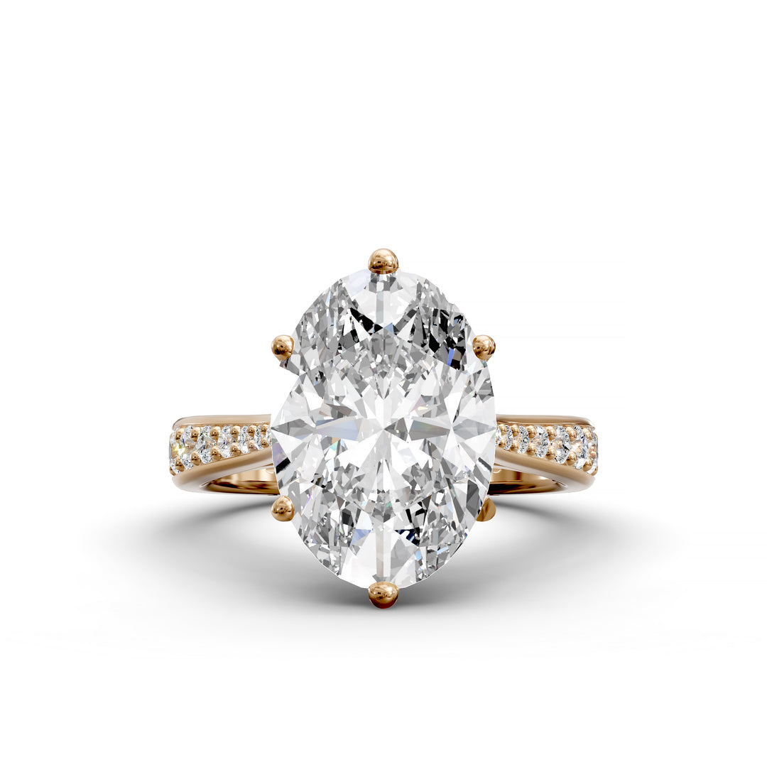Oval diamond cathedral engagement ring with channel-set band shown in studio view.