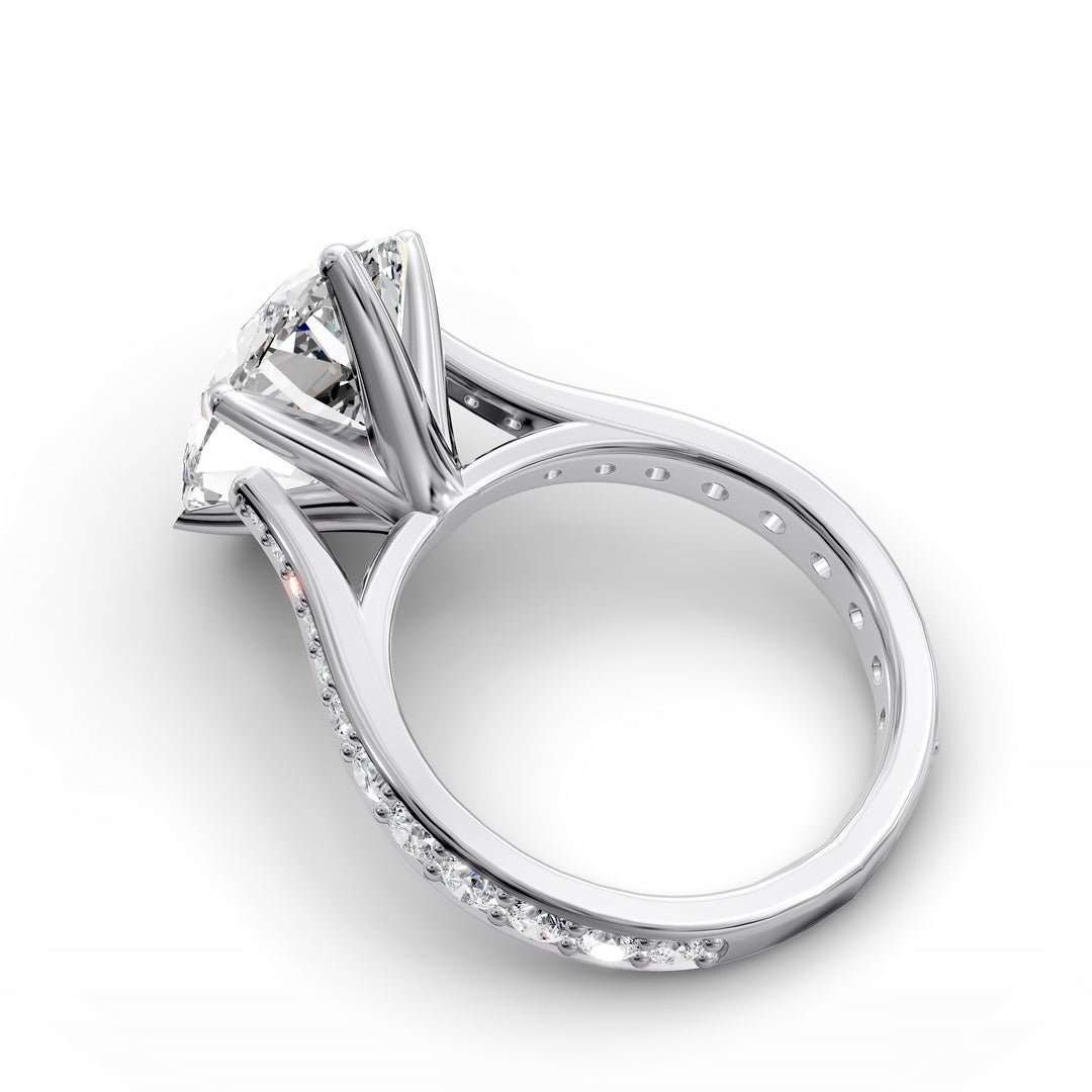 Oval diamond cathedral engagement ring with channel-set band shown in studio view.