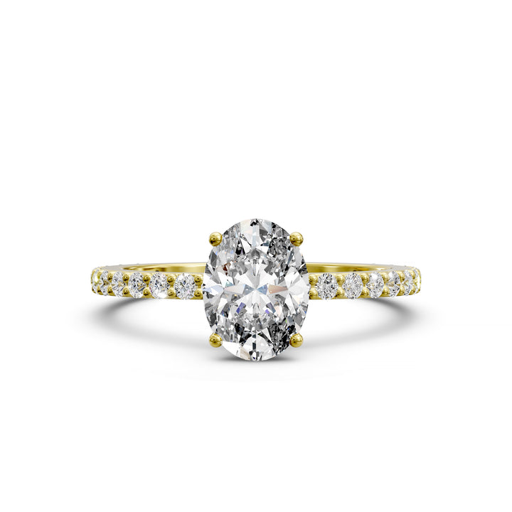 Oval diamond engagement ring with scintillating single row diamond band.