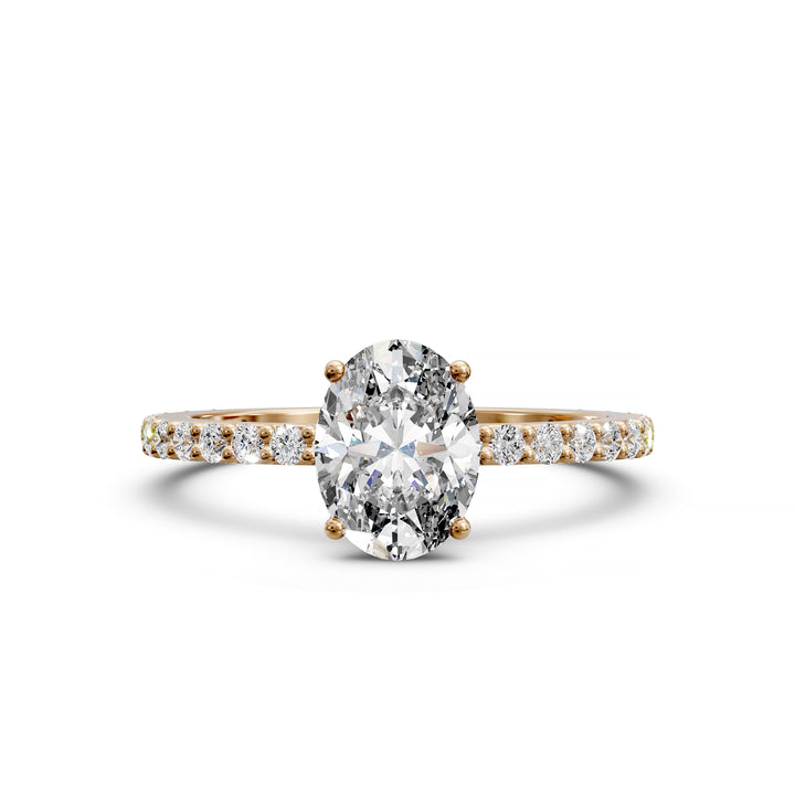 Oval diamond engagement ring with scintillating single row diamond band.