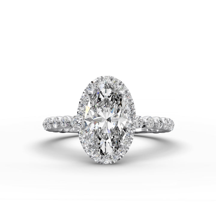 Oval diamond halo engagement ring with floating shared-prong band shown in display view.