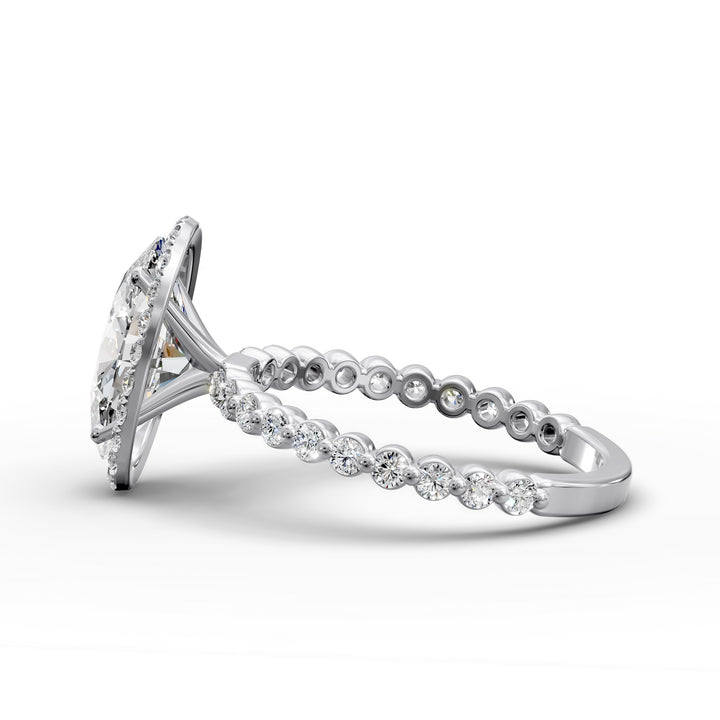 Oval diamond halo engagement ring with floating shared-prong band shown in display view.