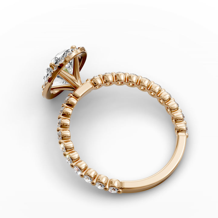 Oval diamond halo engagement ring with floating shared-prong band shown in display view.
