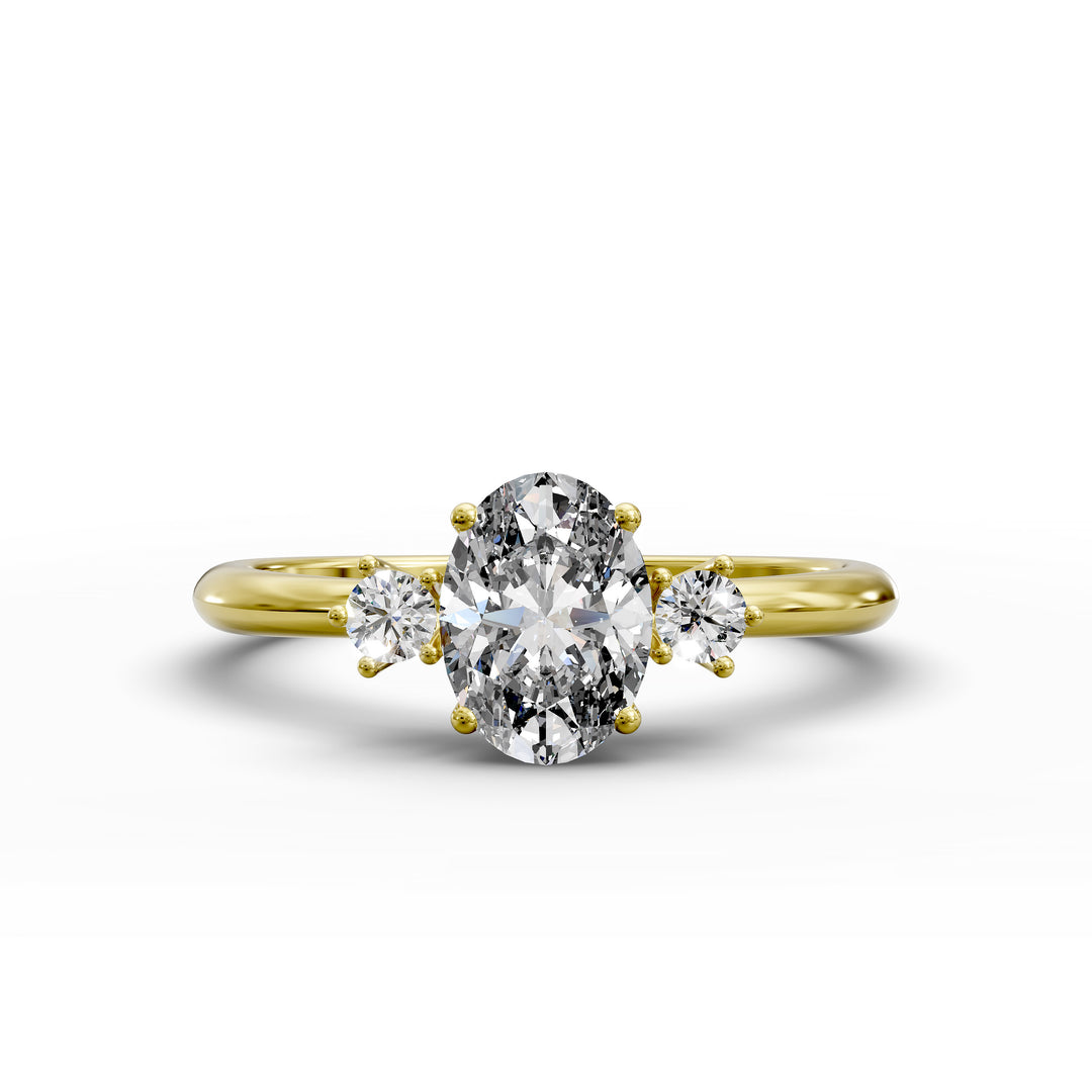 Oval diamond three-stone engagement ring with round side stones shown in display view.