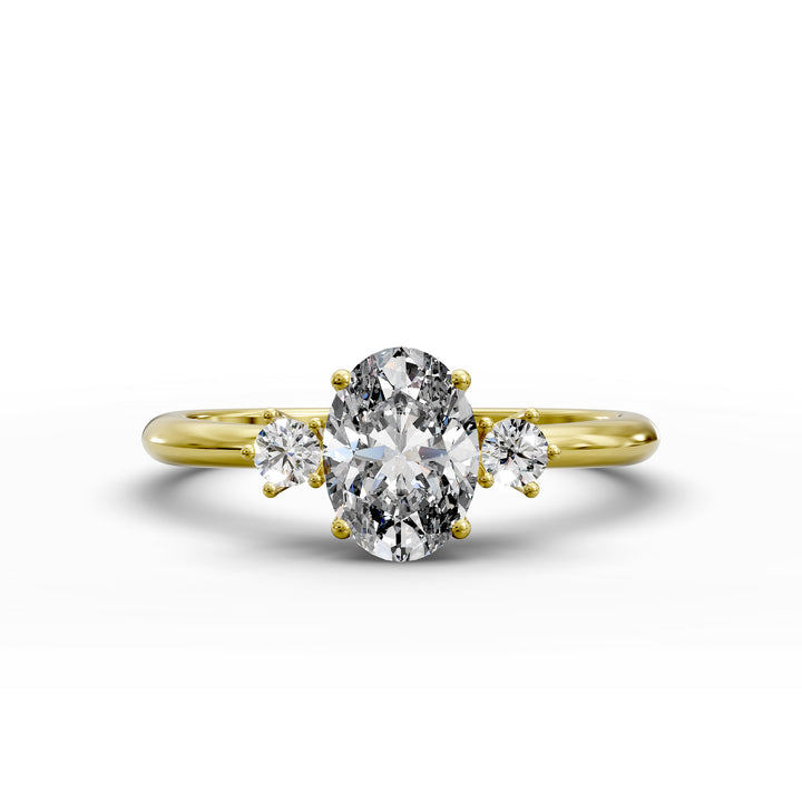 Oval diamond three-stone engagement ring with round side stones shown in display view.