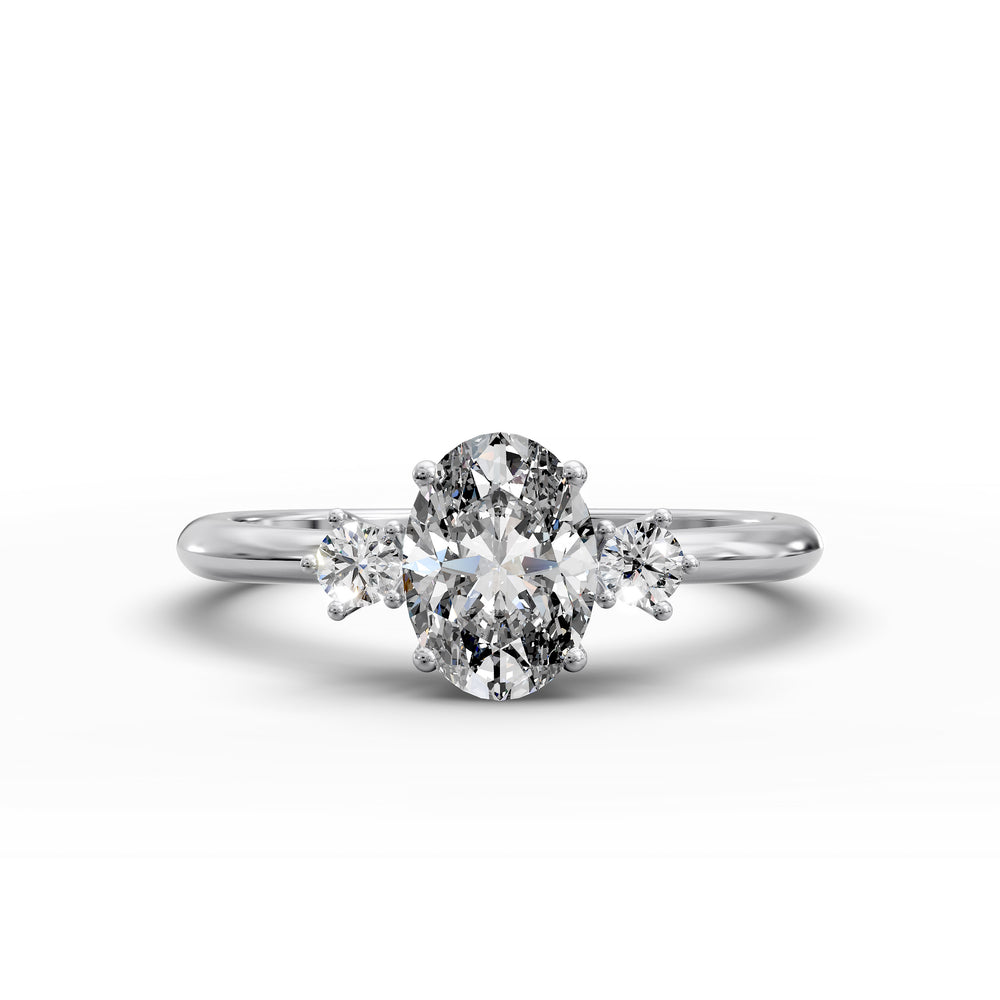 Oval diamond three-stone engagement ring with round side stones shown in display view.