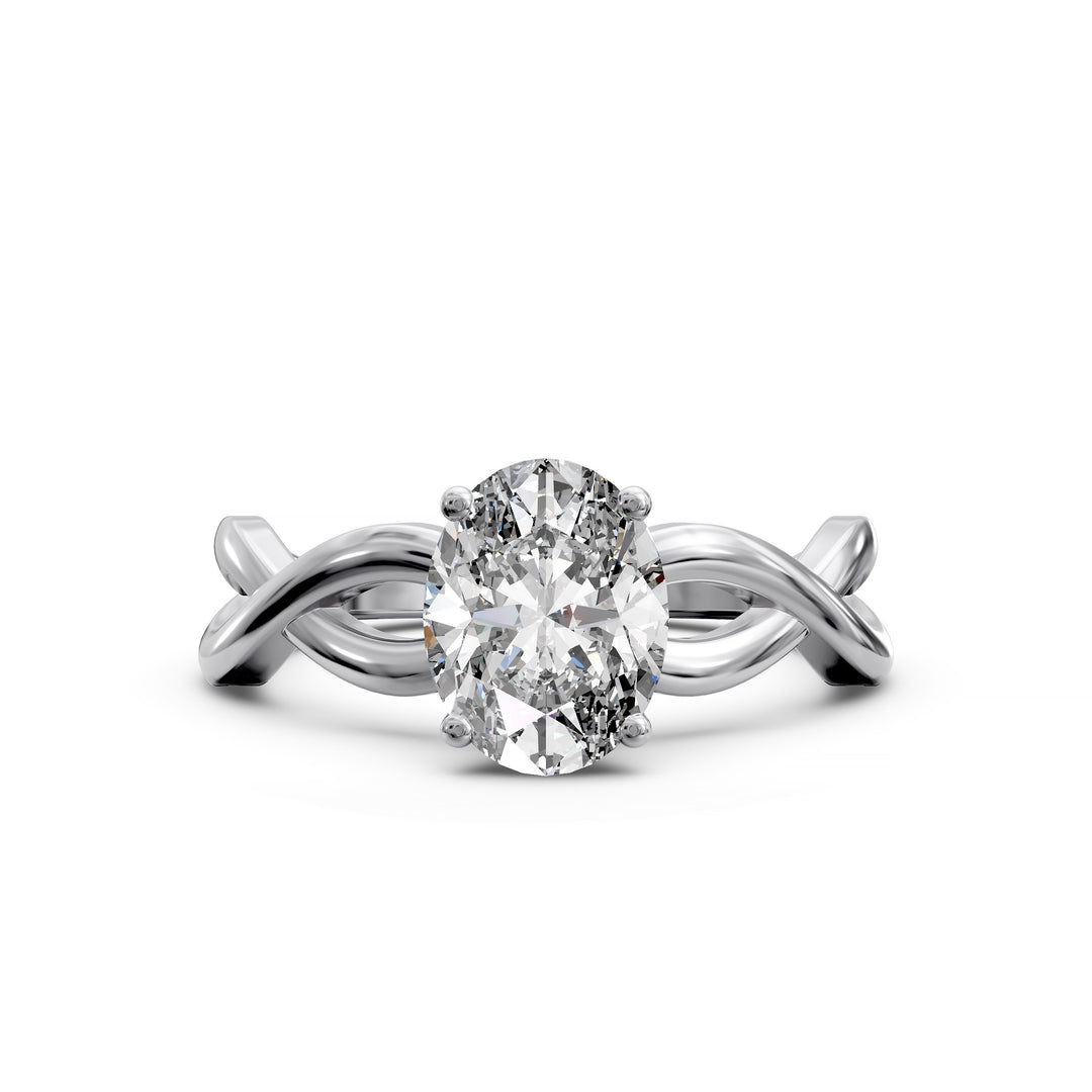 Oval diamond engagement ring with sculpted twisted band design.